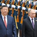 Pentagon warns Beijing about its military ties to Russia, even as Xi and Putin meet