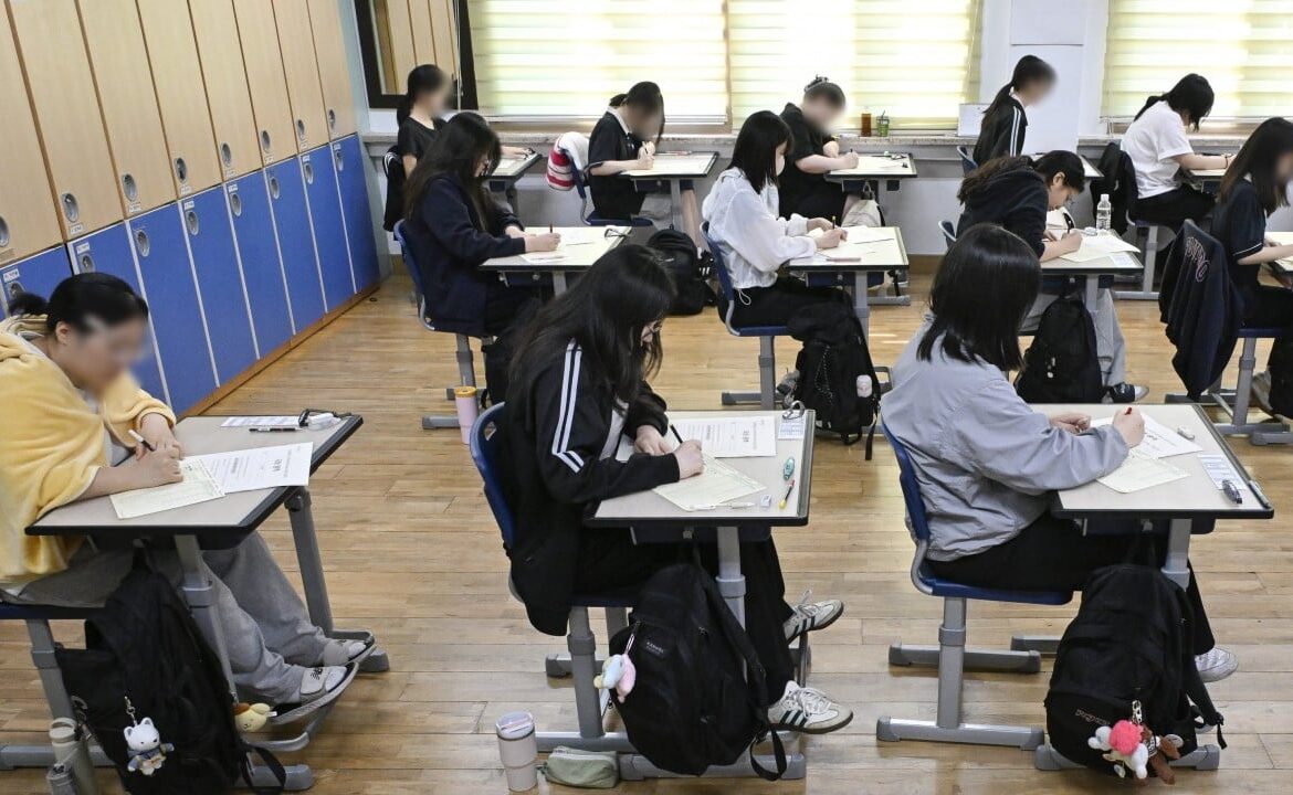 South Korean teacher and parent arrested in late-night exam theft scandal