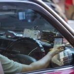 Hong Kong to ban more than 2 phones on vehicle dashboards from January 2026