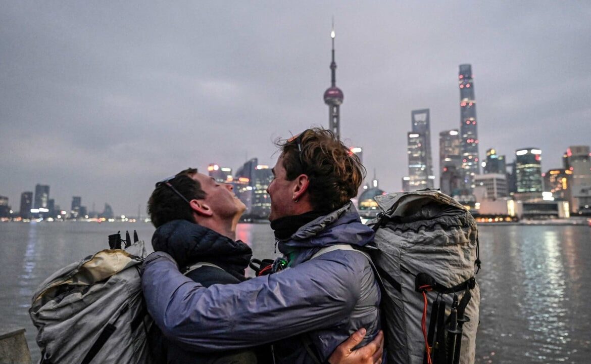 French duo reach Shanghai, China, after walking over 12,000km in 518 days