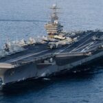 Trump hints at sending second aircraft carrier, as US and Iran plan next talks