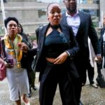 Hong Kong court convicts British woman of blackmailing banker over false rape claim