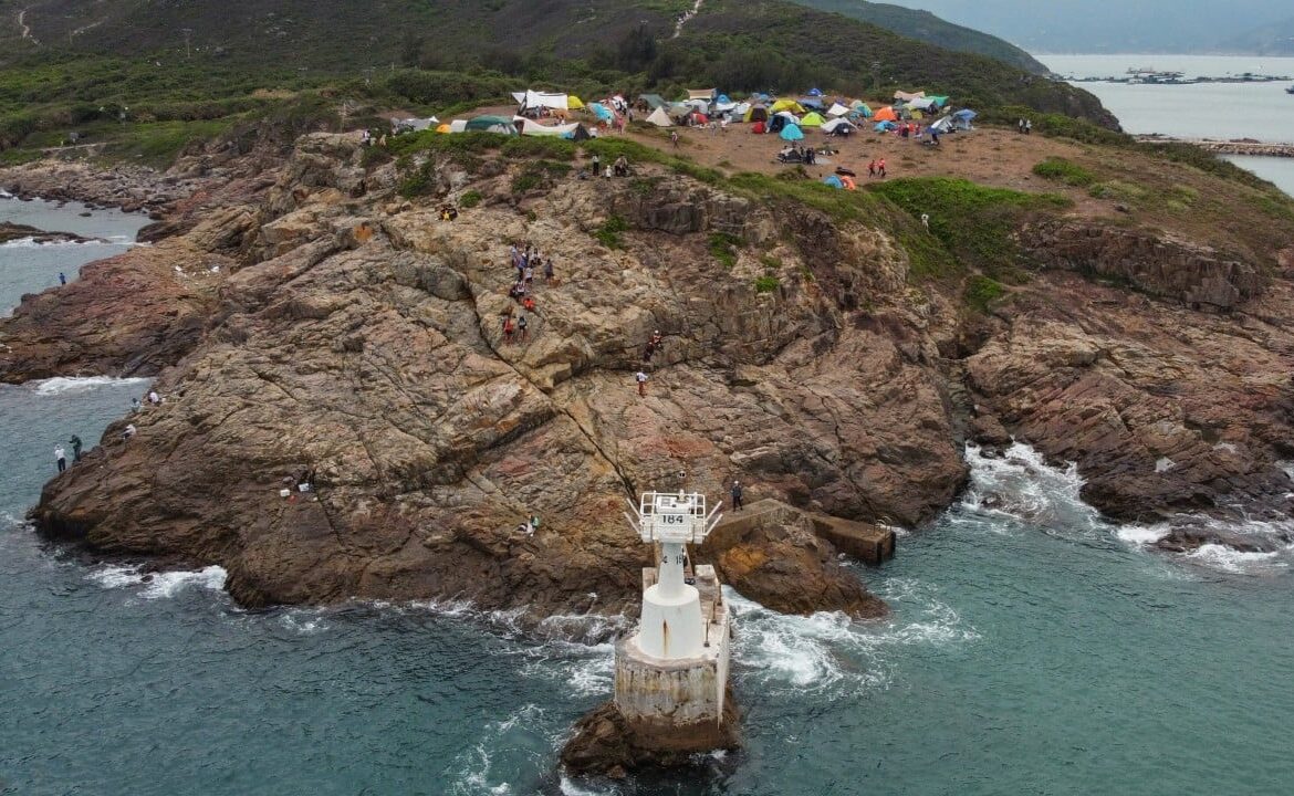 Woman rescued after falling into sea while taking photos at a Hong Kong lighthouse