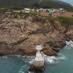 Woman rescued after falling into sea while taking photos at a Hong Kong lighthouse