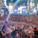 Crowd disarms knife-wielding woman at Malaysia water festival
