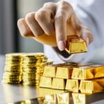 Gold loses its shimmer in Asia over rising oil prices, hawkish Fed stance
