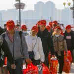 China removes hukou hurdle for migrant workers in social insurance shake-up
