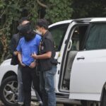 Life sentences for Hong Kong pair who suffocated man with tape in village temple