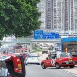 Driver, passenger hurt as taxi collides with truck in Hong Kong