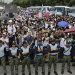 Philippine religious group challenges Marcos, seeks to shield senator over probe