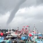 Hong Kong cancels red rainstorm signal after hour as suspected waterspout spotted