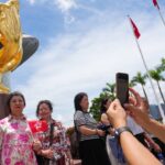 Mainland Chinese tourists pack landmarks as Hong Kong marks 29th anniversary