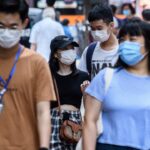 COVID-19 Infections Peak in Southern China Amid Nationwide Surge
