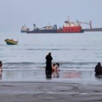 Iran seeks to bar US ships as Hormuz deal with Oman advances