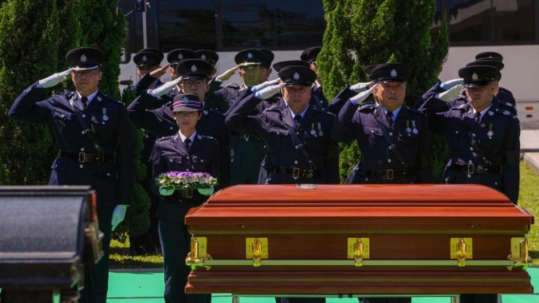 Hong Kong constable paralysed in 2005 knife attack laid to rest with full honours