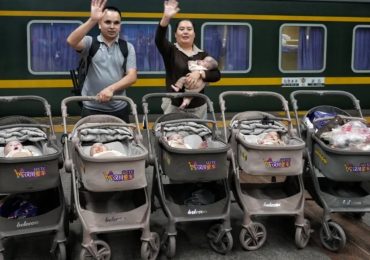Strangers and railway staff help Chinese couple bring quintuplets home by train