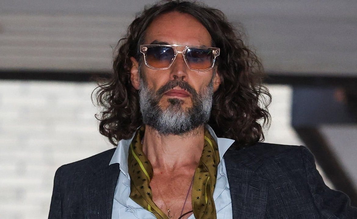 Woman tells UK court Russell Brand dragged her into bar toilet and raped her